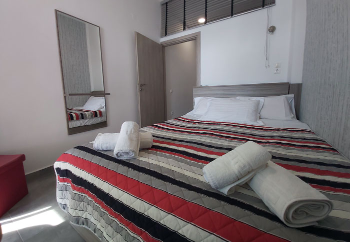 large-first-bedroom-on-the-ground-floor-Irini-apartments